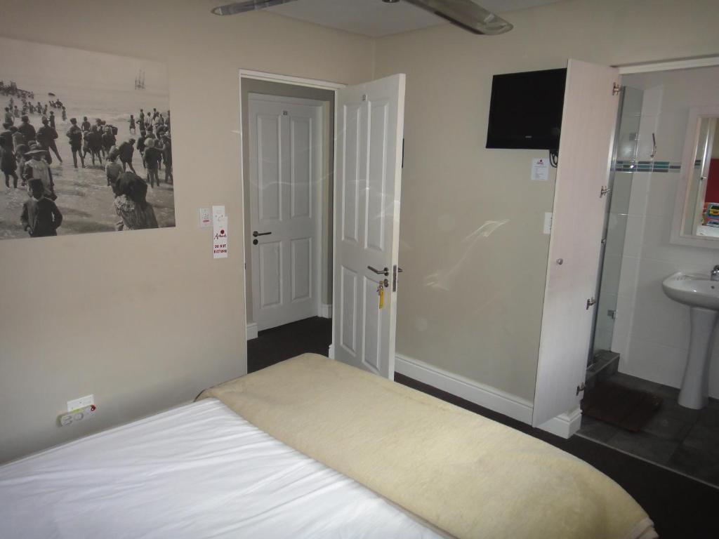 Ashanti Lodge Green Point Cidade Do Cabo Quarto foto